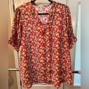 Size 2X First Love Floral Tomato Red Women's Blouse. Has elastic sleeves.